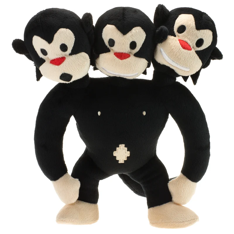 Singe à trois têtes en peluche