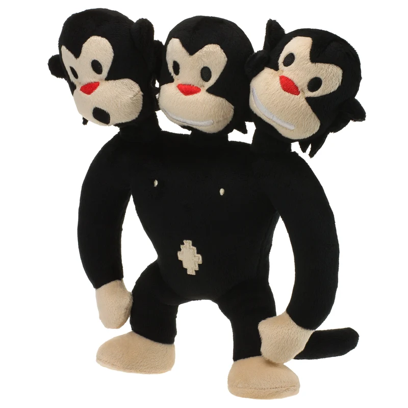 Singe à trois têtes en peluche